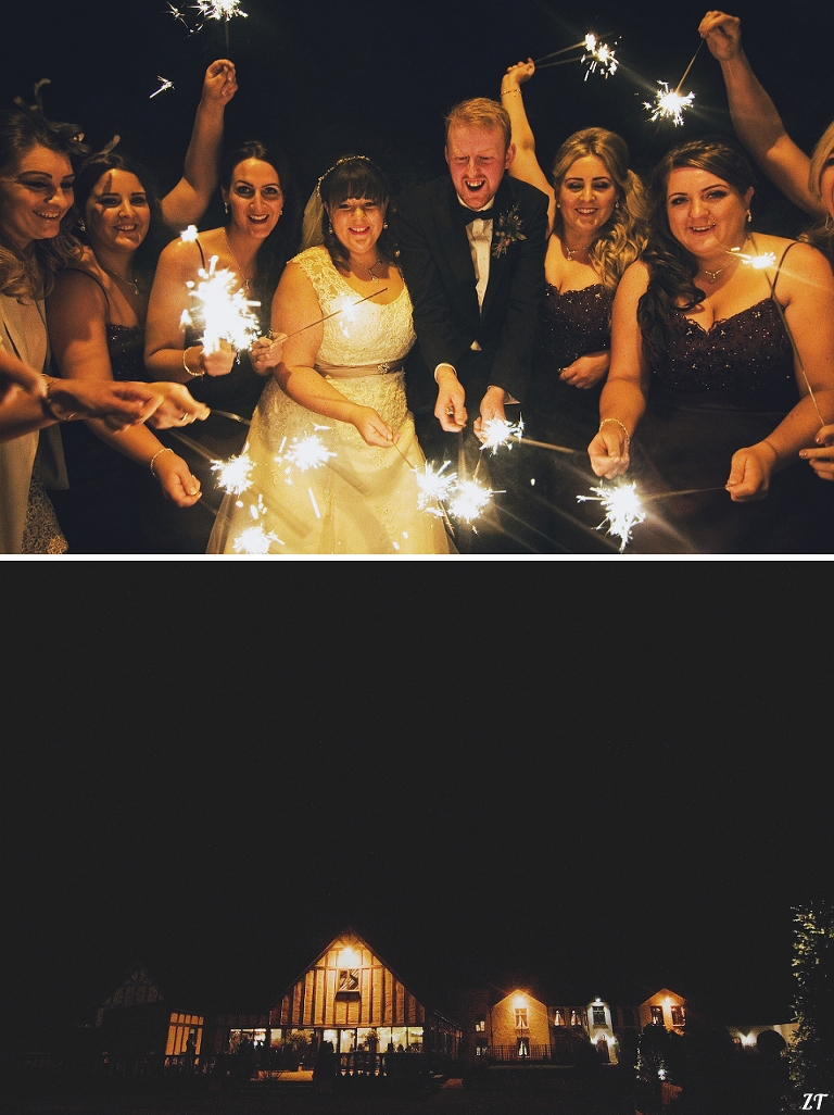 Bridal party with wedding sparklers at The Great Hall at Mains