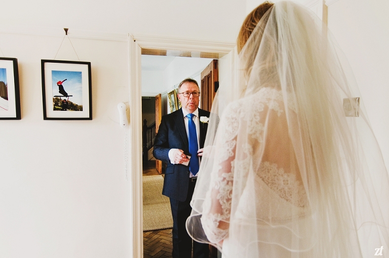 Dad and daughter on her wedding day