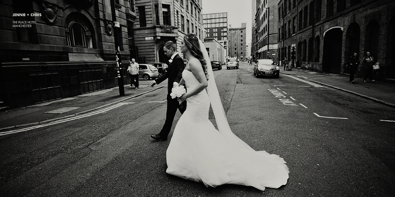 Black and white photo of a wedding in Manchester city centre
