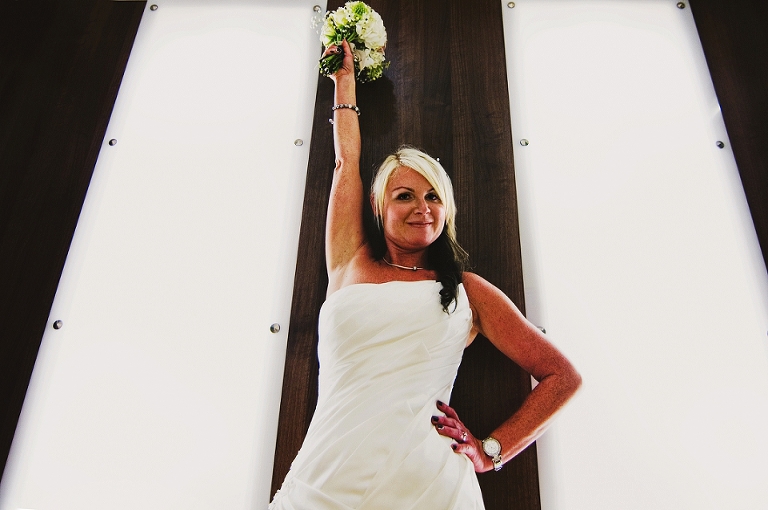 Bride celebrating at her wedding in Wigan