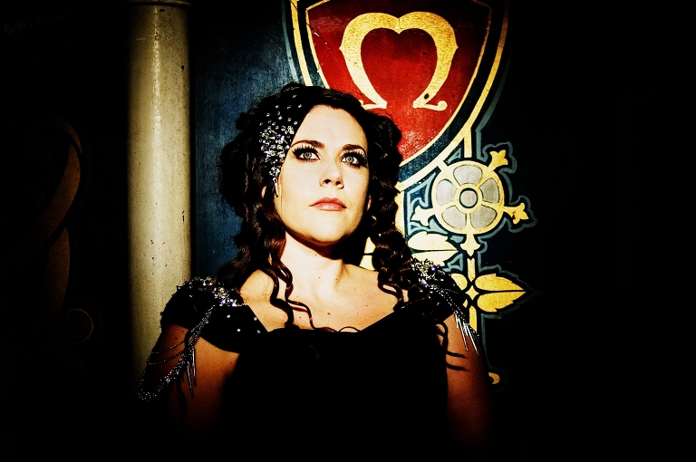 Gothic inspired photograph by ZT Photography of a bride wearing a black wedding dress with studs and chains