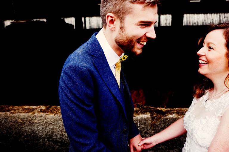 Bride and groom on a farm wedding in cumbria