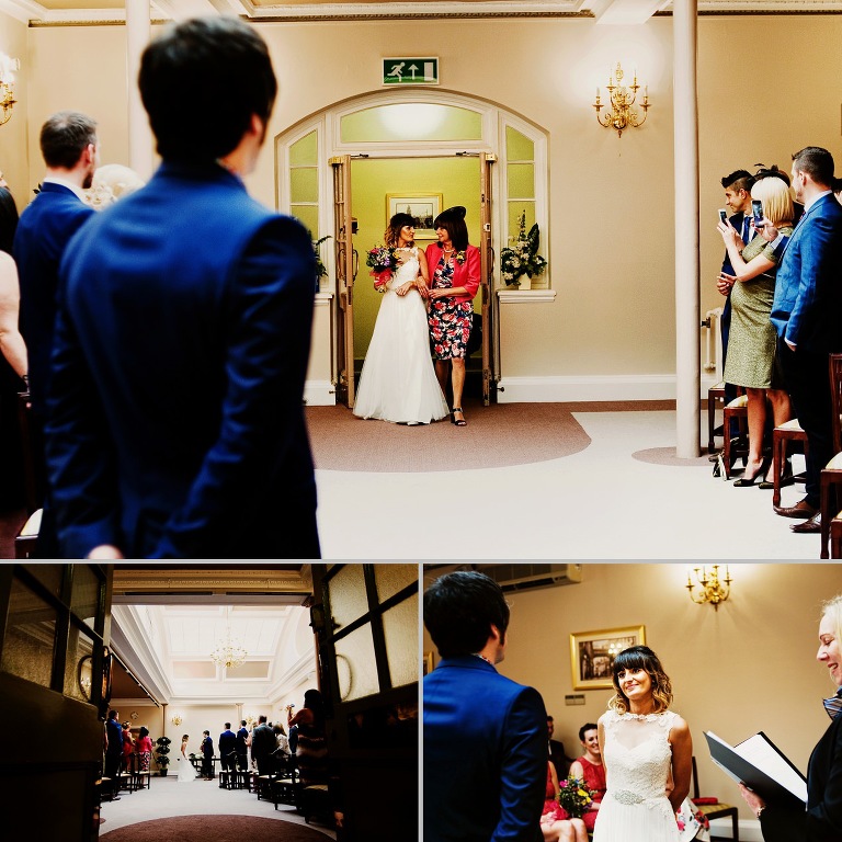 Bride with mother of bride walking down aisle at registry office in stockport, Manchester