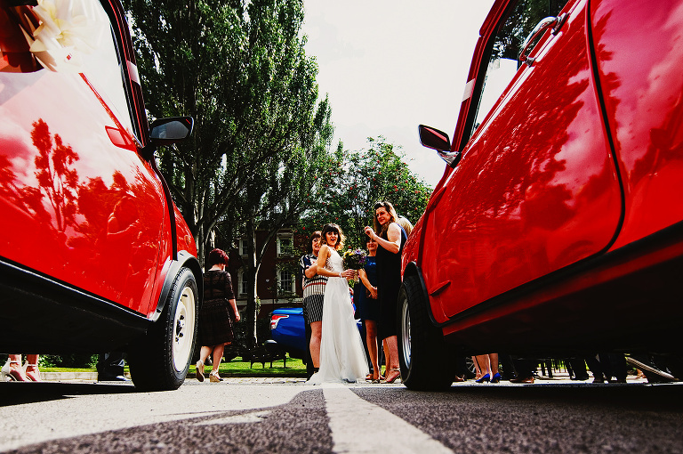 Red mini outside stockport town hall.