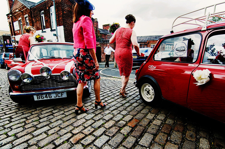 red mini cars at a whitebottom farm wedding in manchester.