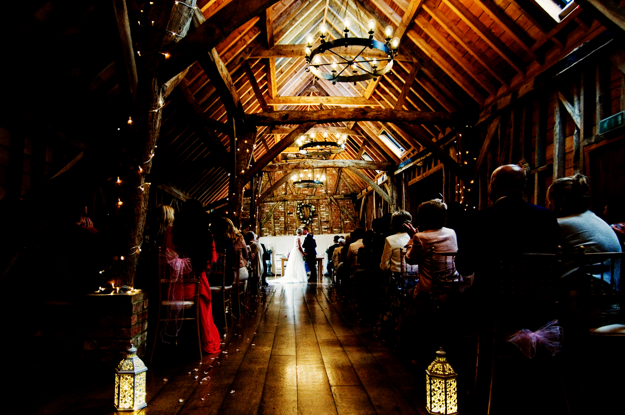 Bassmead Manor Barns wedding photography of a beautiful ceremony in the rickety barn.