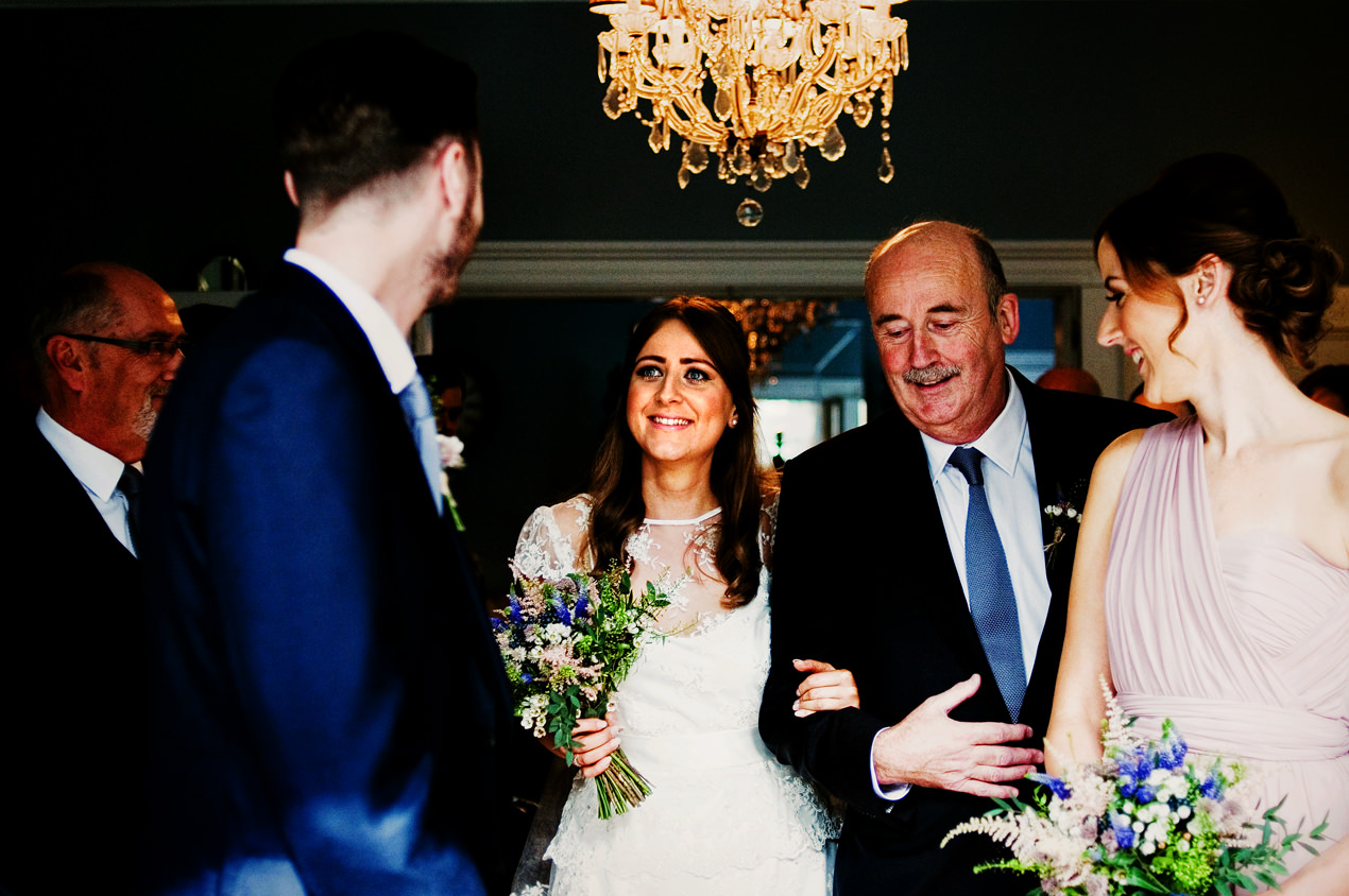Didsbury House Hotel Wedding Photography of a bride walking down the aisle with her Dad.