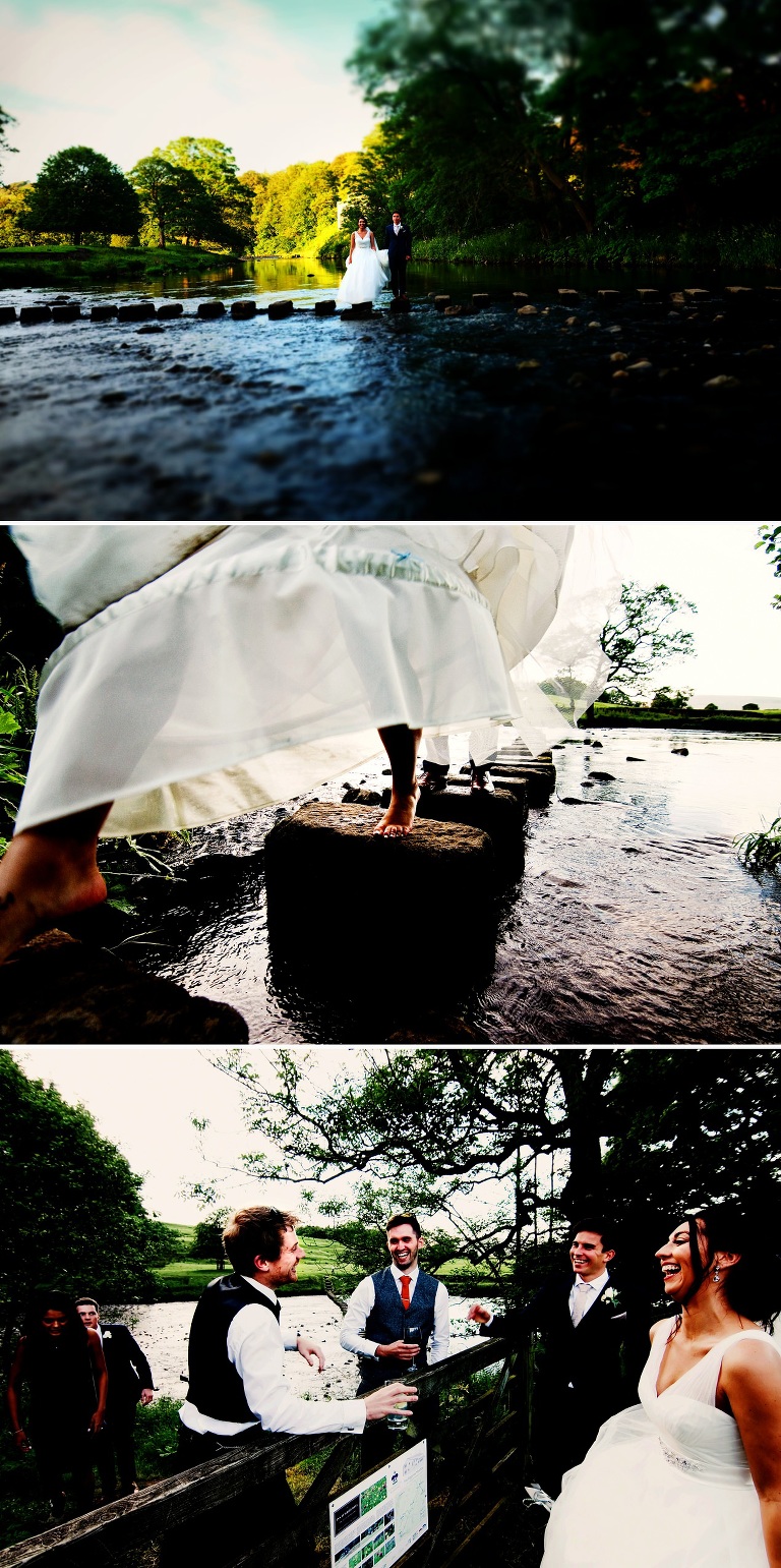 Bride and Groom on stepping stones across the river Hodder in whitewell