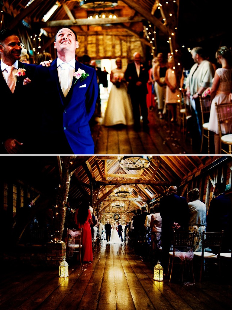 Candle-lit ceremony inside the rickety barn at bassmead manor barns cambridgeshire