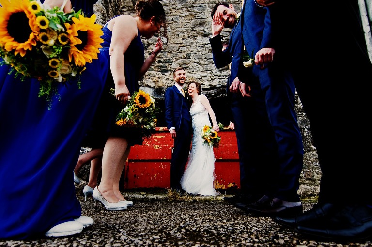 Bright golden yellow sunflower inspired wedding bouquets and buttonholes.