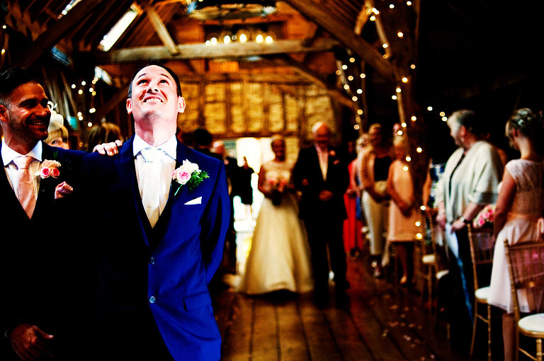 Groom getting emotional at his unplugged ceremony at Bassmead Manor Barns.
