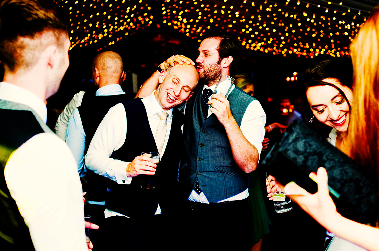 Fun relaxed wedding photography on the dancefloor at the Inn At Whitewell.