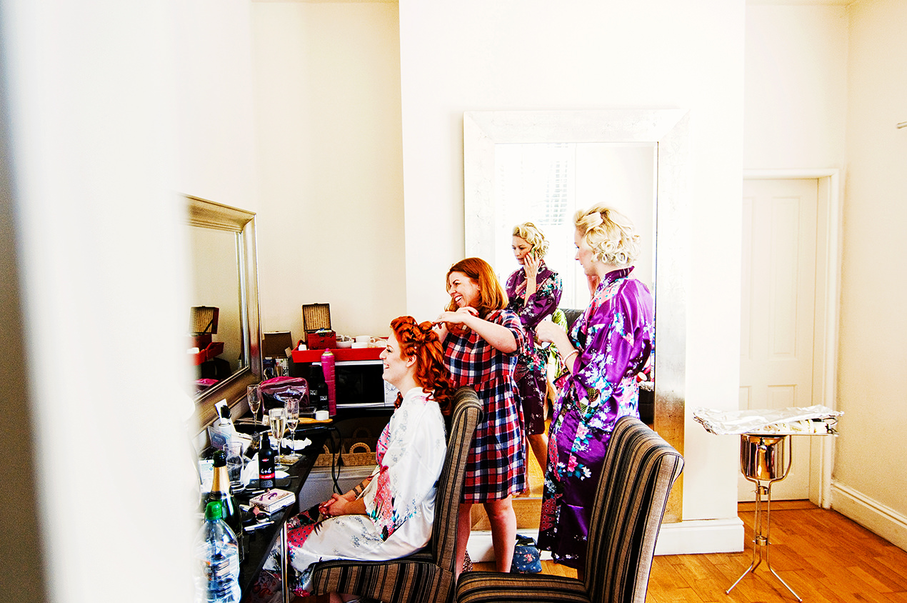 Bridal prep inside The Gatehouse at Samlesbury Hall.