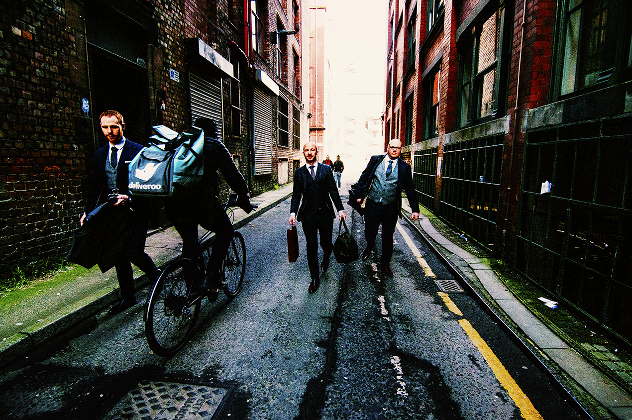 Groom and best men walking to Abode wedding venue in manchester.