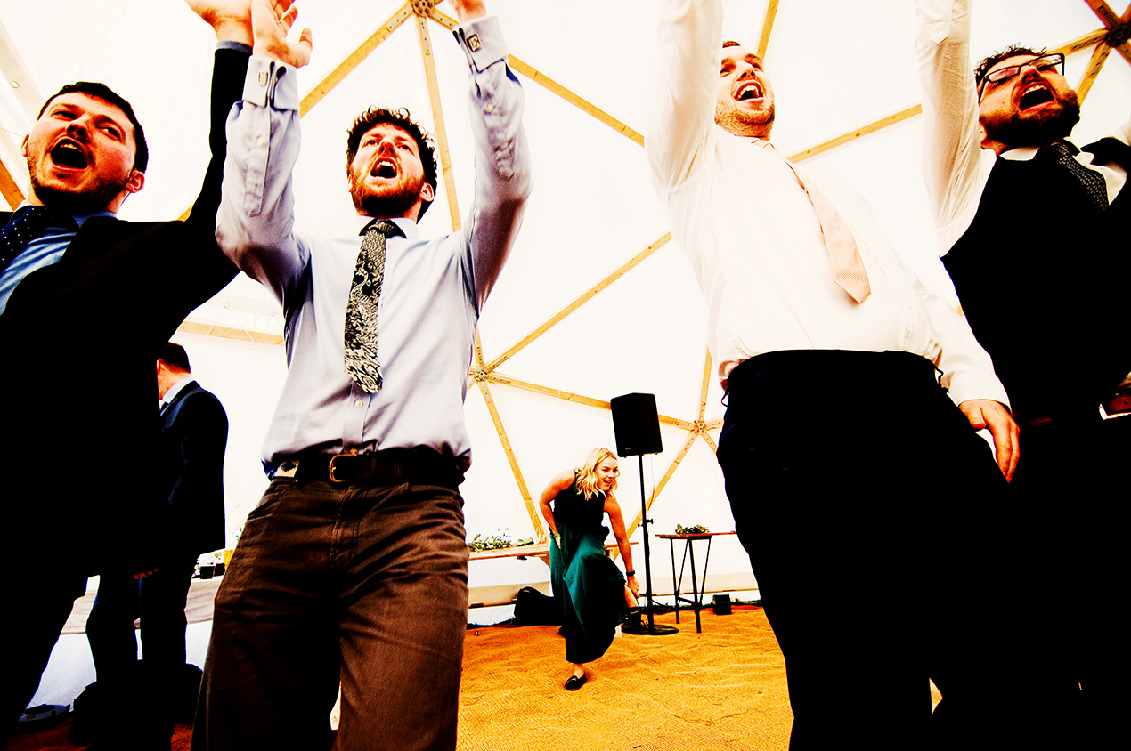 Ceildh dancing at a festival wedding.