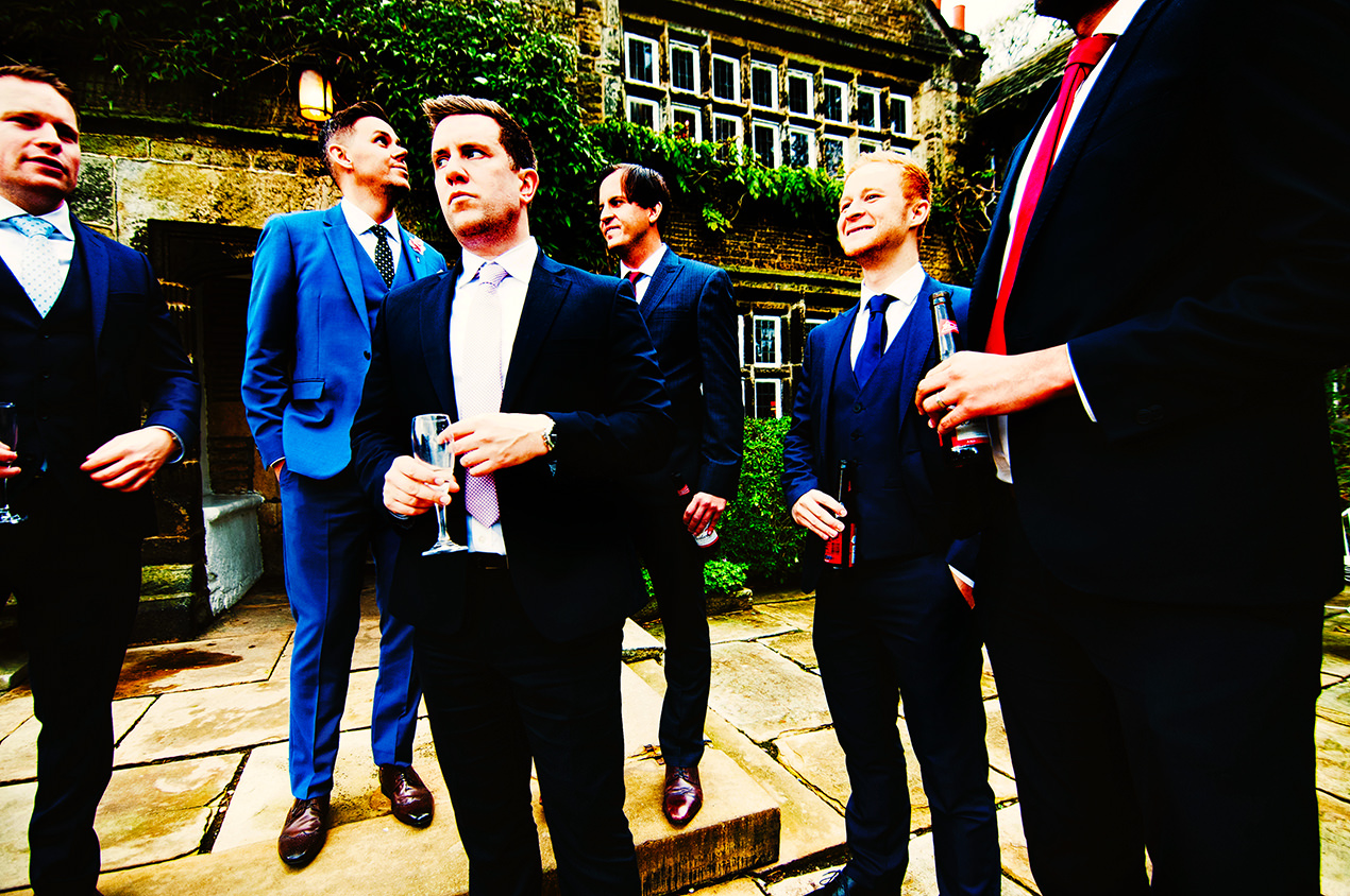 Six wedding guests outside Holdsworth House in Yorkshire.