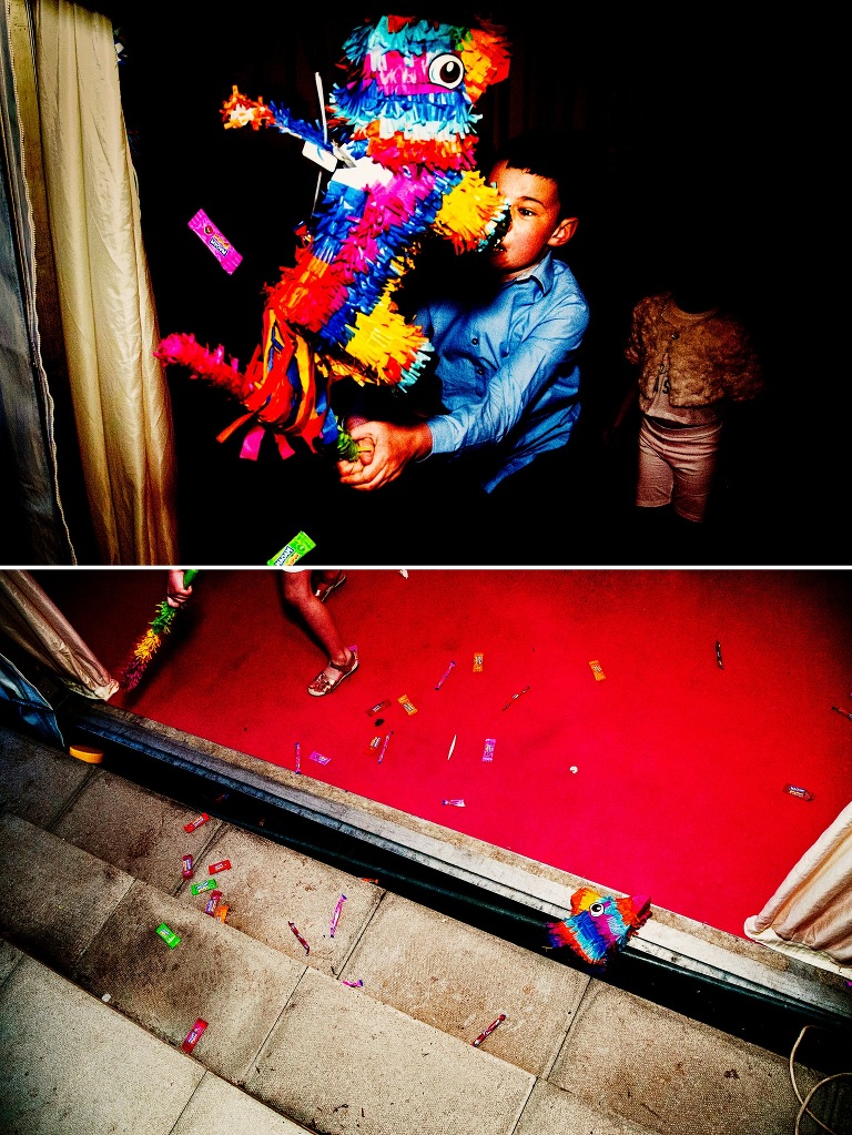 Boy hitting a pinata.