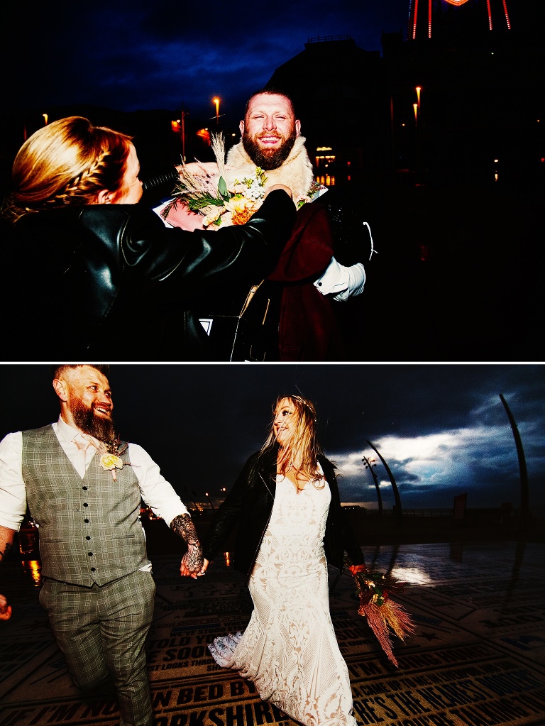 Bride and groom walking on the comedy carpet on their blackpool wedding chapel day.
