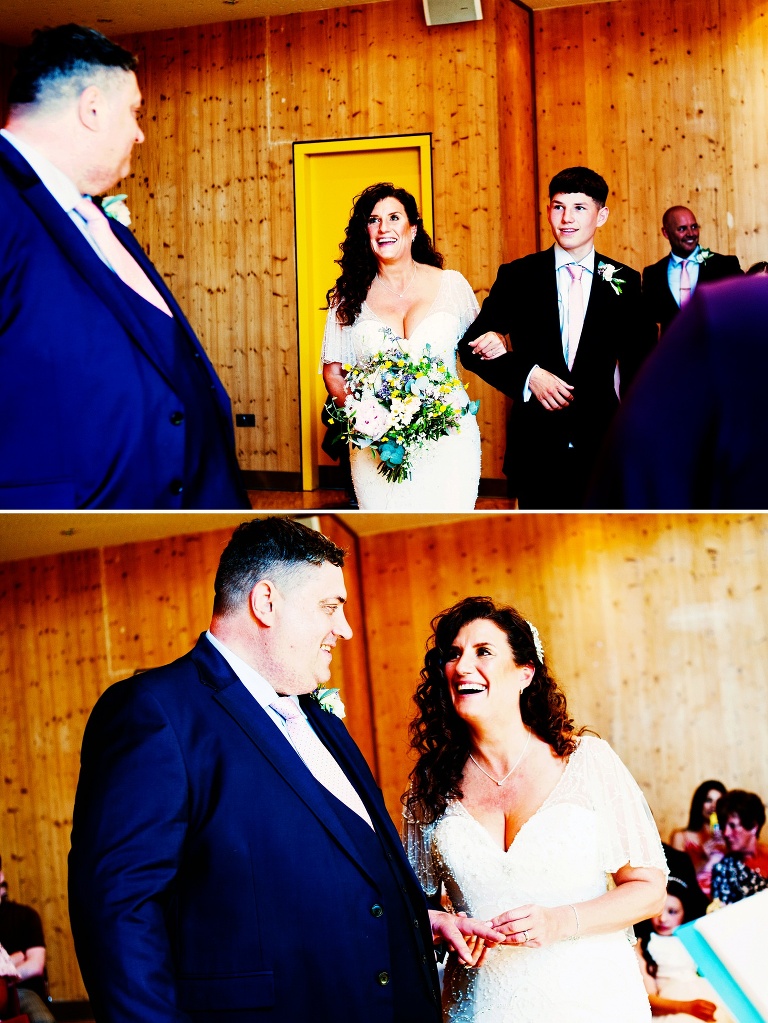 Bride walking down the aisle towards the groom at the wedding chapel in Blackpool.