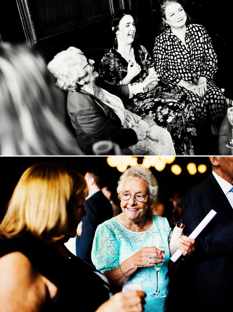 Wedding guests drinking inside manchester Hall.